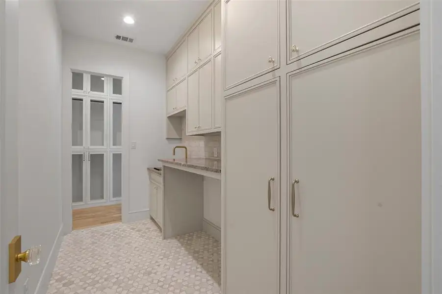 Utility room downstairs. There is another utility room upstairs. Utility room downstairs. There is another utility room upstairs.