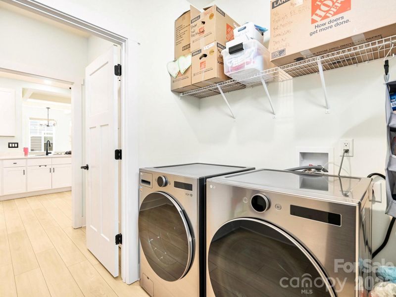 Main floor laundry. W/D may stay with home. Pantry.