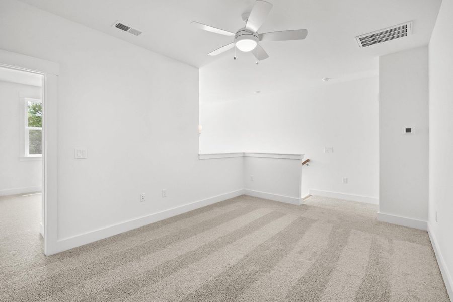 Spacious, unfurnished interior of a new home in Long Bay Golf Club, Longs (Image 32).