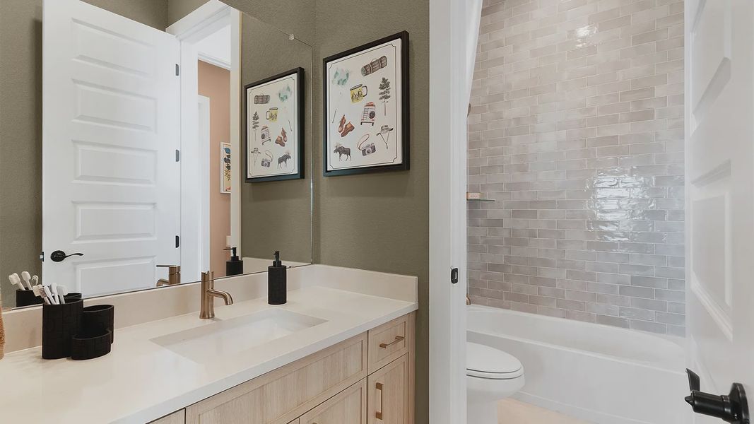 Representative furnished interior of a home built from the Silas by Chesmar Homes in Crescent Bluff, Georgetown (Image 30).