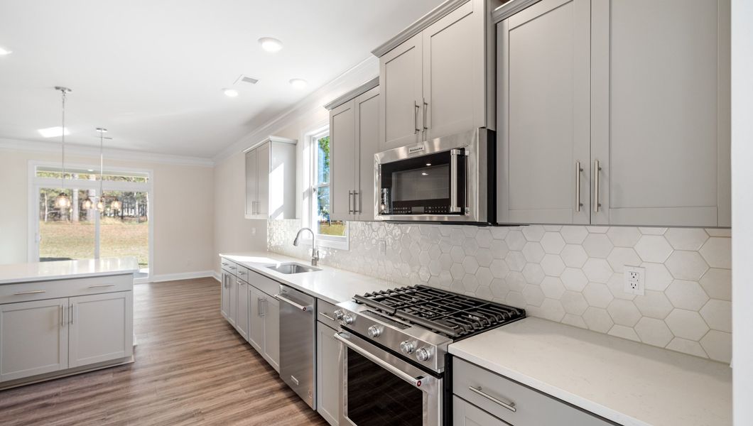 Representative furnished interior of a home built from the LONDON by D.R. Horton in Adams Glen, Greenville (Image 6).