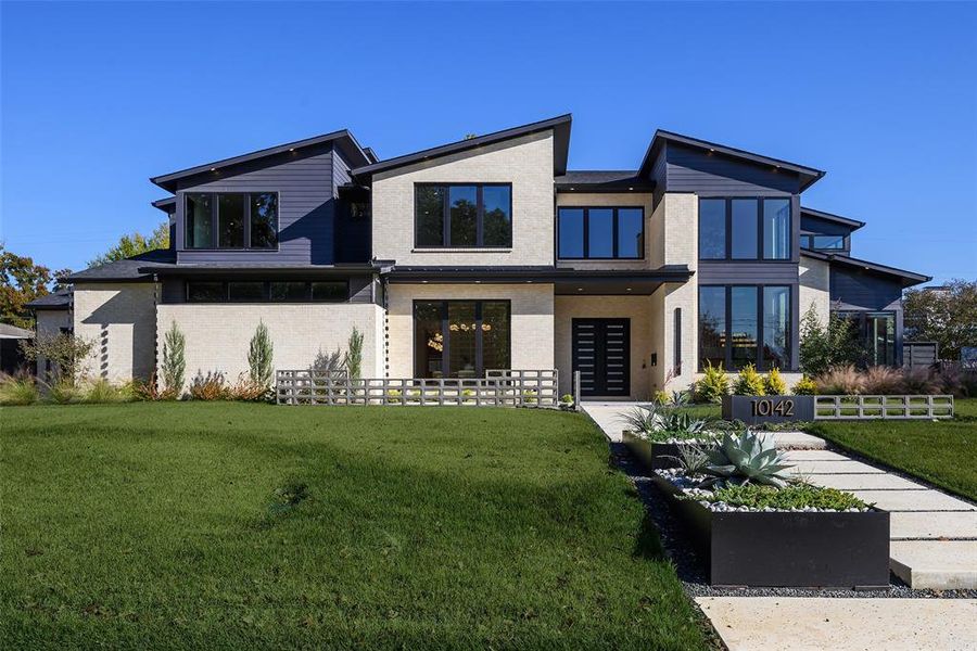 Front exterior of a new home in , Dallas, TX, highlighting curb appeal (Image 25).