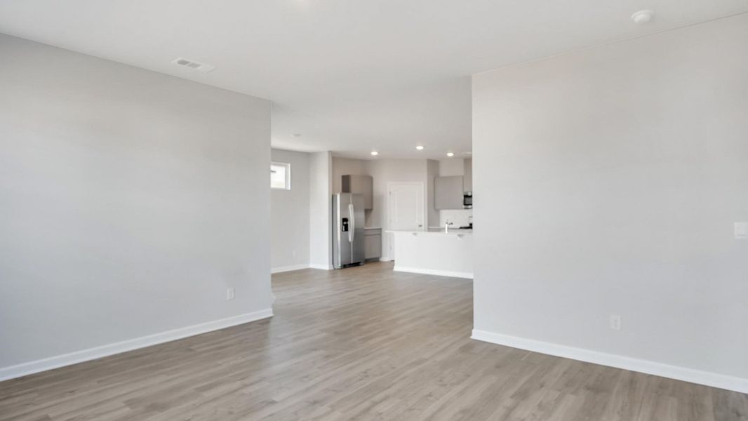 Representative unfurnished interior of a home built from the Arlington by D.R. Horton in Legacy Farms, White House (Image 23).