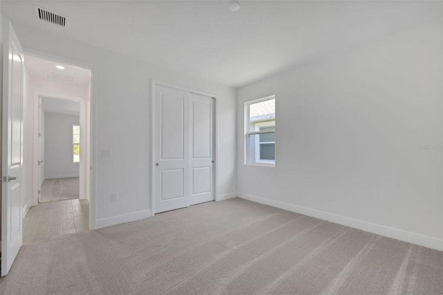 Spacious, unfurnished interior of a new home in Angeline, Land O' Lakes (Image 30).