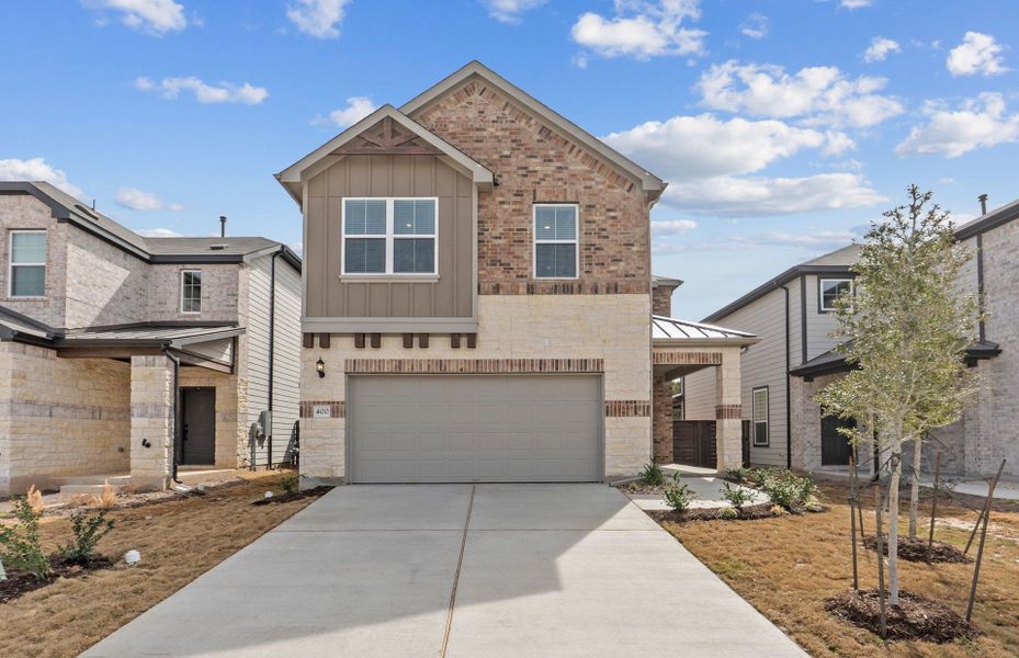 Front exterior of a new home in Horizon Lake, Leander, TX, highlighting curb appeal (Image 24). Front exterior of a new home in Horizon Lake, Leander, TX, highlighting curb appeal (Image 24).