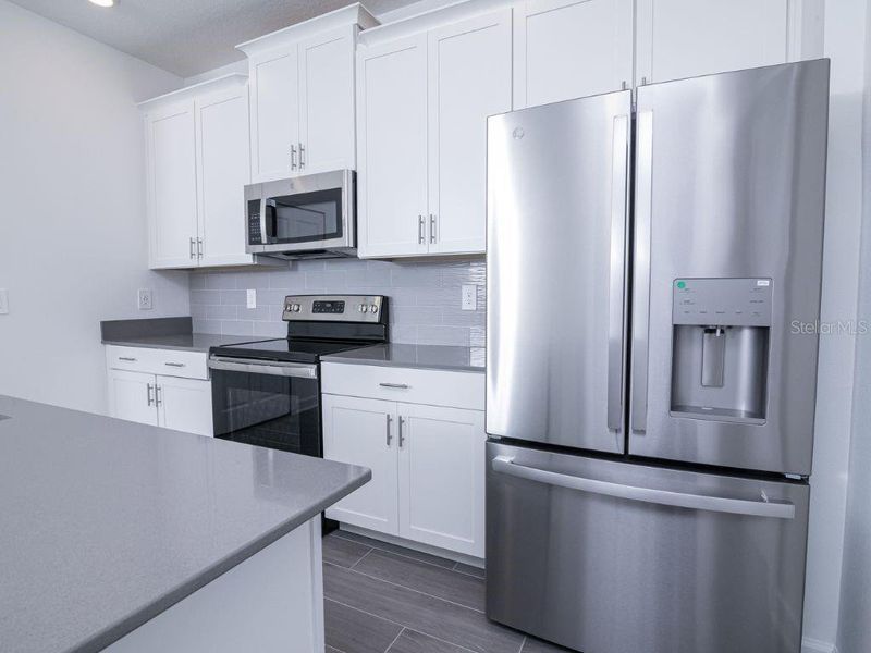 Furnished interior view inside a new home in , Orlando (Image 11).