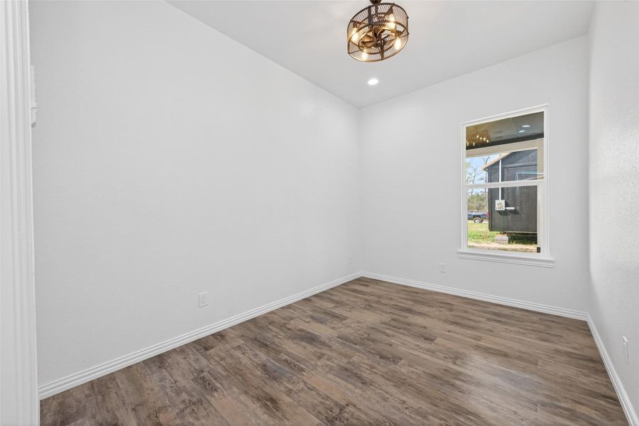 Spacious bedroom with easy access to the shared bathroom.