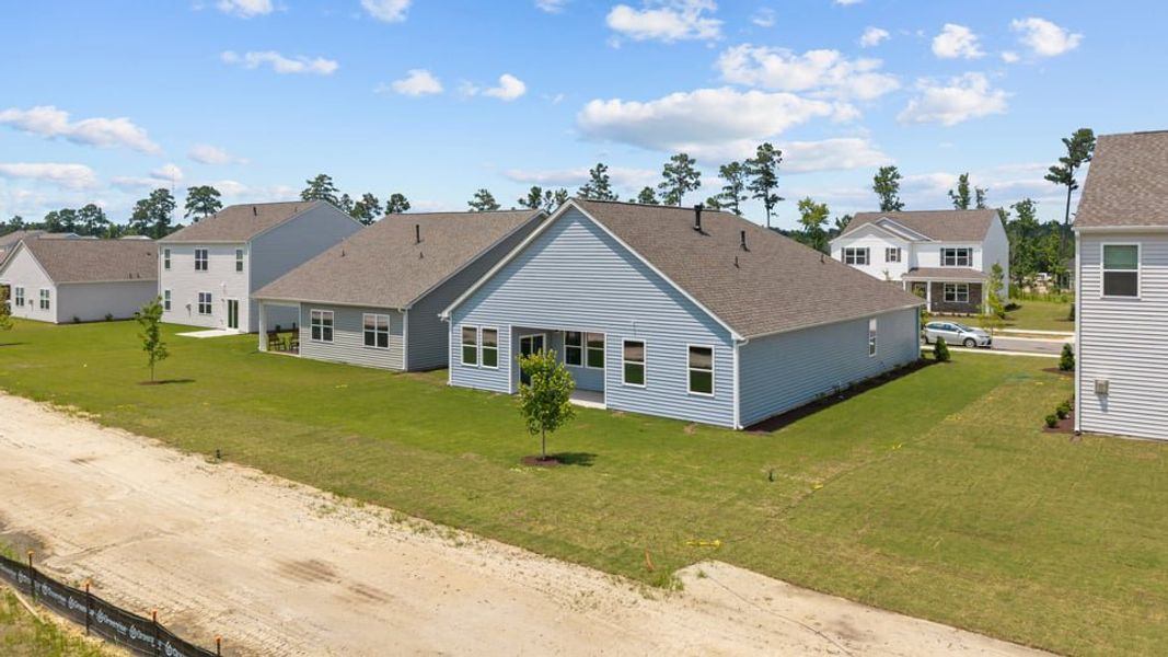 Exterior details and patio area of a home in West New Bern, New Bern (Image 26).