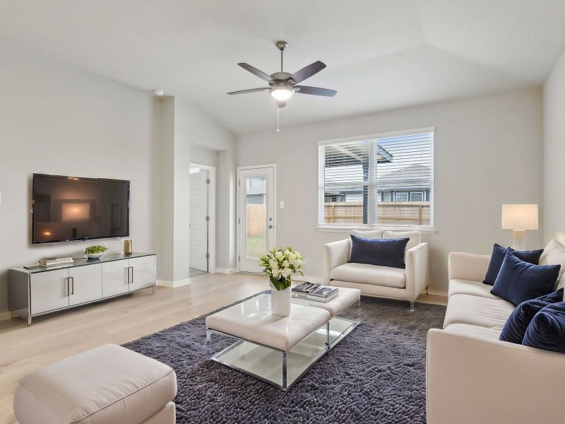 Virtually staged living room in the San Jacinto floorplan at a Meritage Homes community.