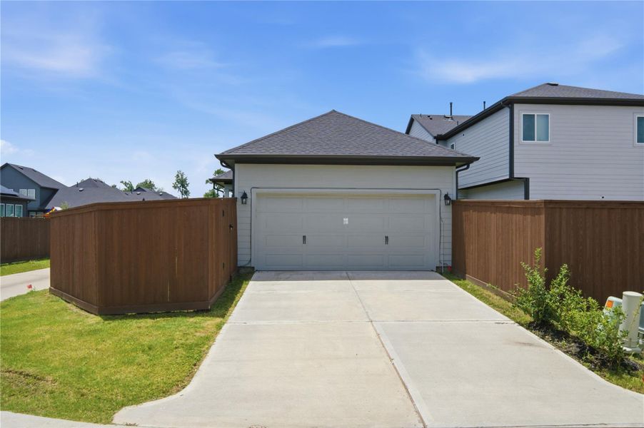 Front exterior of a new home in The Groves 35', Humble, TX, highlighting curb appeal (Image 21).