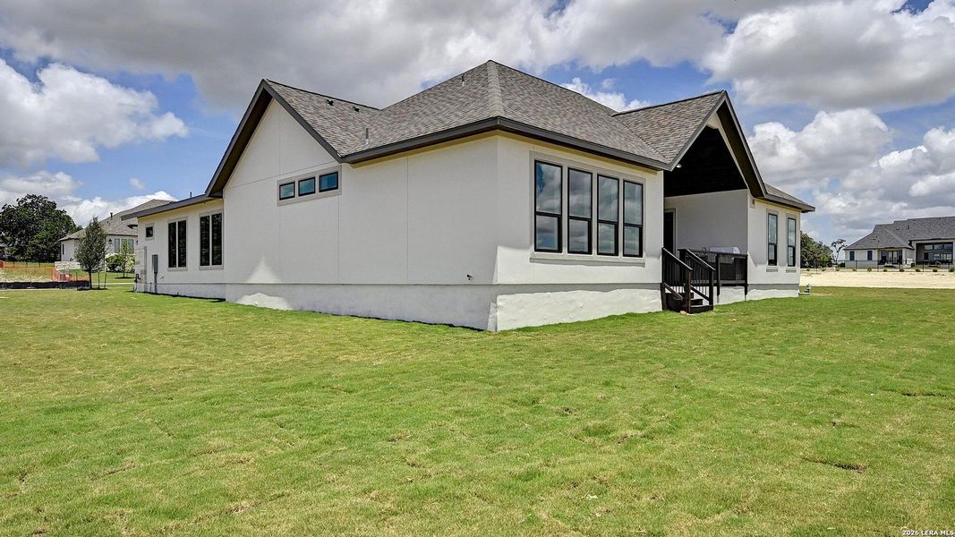 Exterior details and patio area of a home in George's Ranch, Boerne (Image 3).