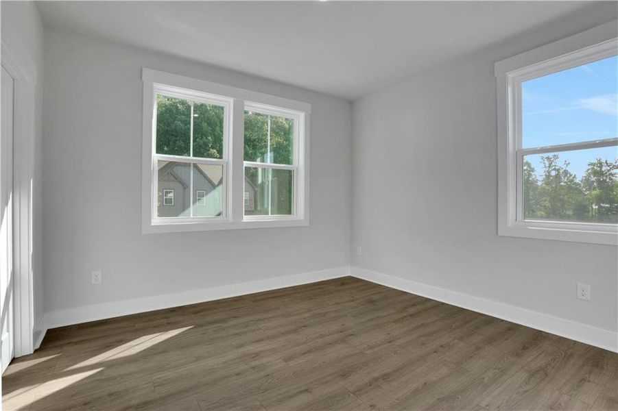 Spacious, unfurnished interior of a new home in The Paddocks at Doc Hughes, Buford (Image 20).