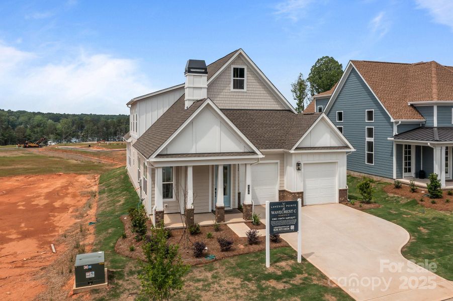 Front exterior of a new home in Lakeside Pointe, Sherrills Ford, NC, highlighting curb appeal (Image 20).