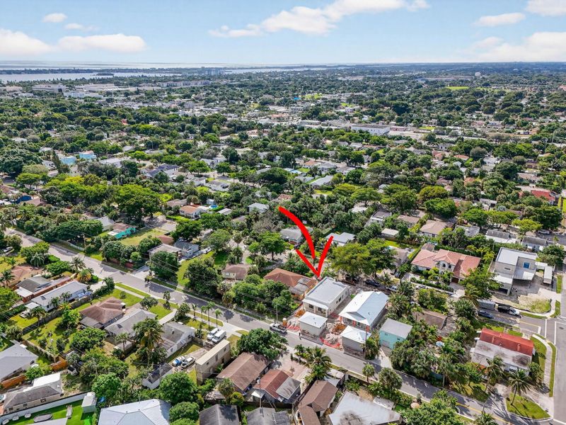 Front exterior of a new home in , West Palm Beach, FL, highlighting curb appeal (Image 13). Front exterior of a new home in , West Palm Beach, FL, highlighting curb appeal (Image 13).
