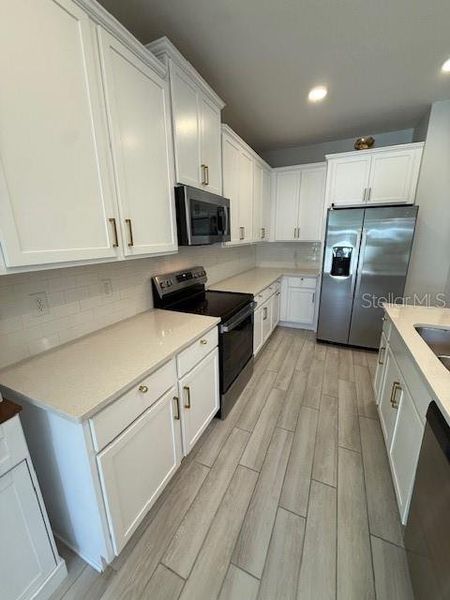 Furnished interior view inside a new home in , Winter Garden (Image 54).