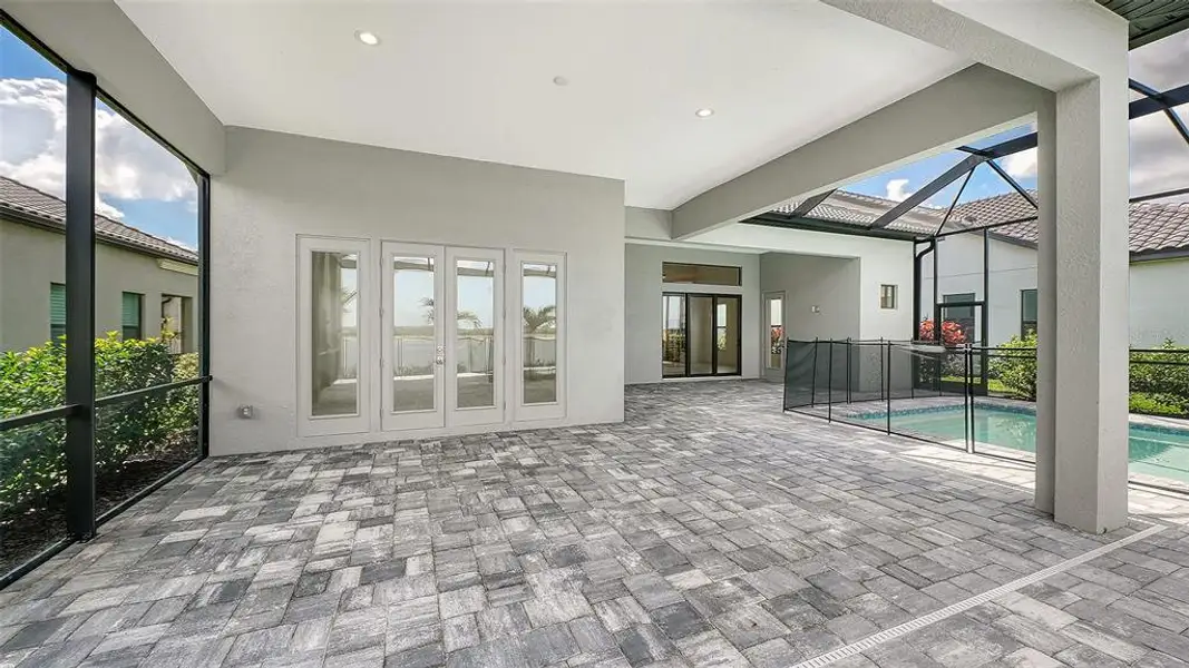 Exterior details and patio area of a home in , Nokomis (Image 24).