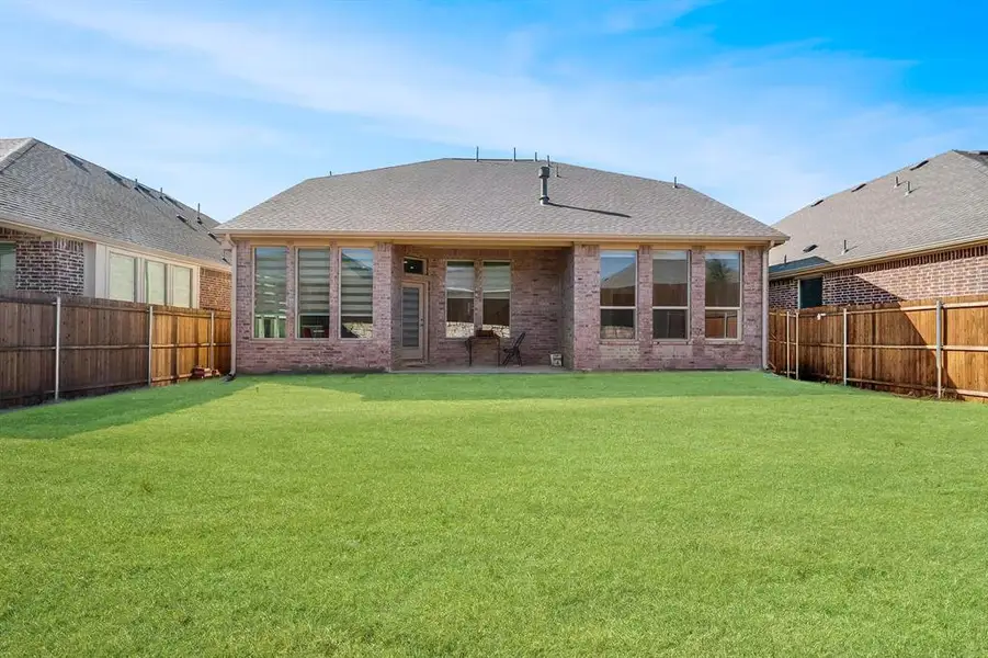 Exterior details and patio area of a home in Northlake Estates, Little Elm (Image 3). Exterior details and patio area of a home in Northlake Estates, Little Elm (Image 3).