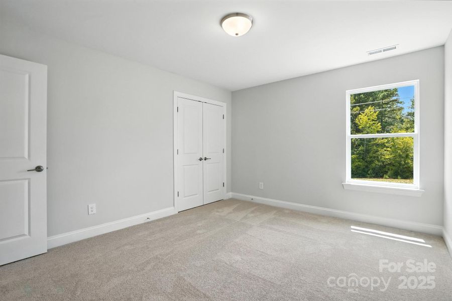 Spacious, unfurnished interior of a new home in Hampton Woods, Charlotte (Image 33).