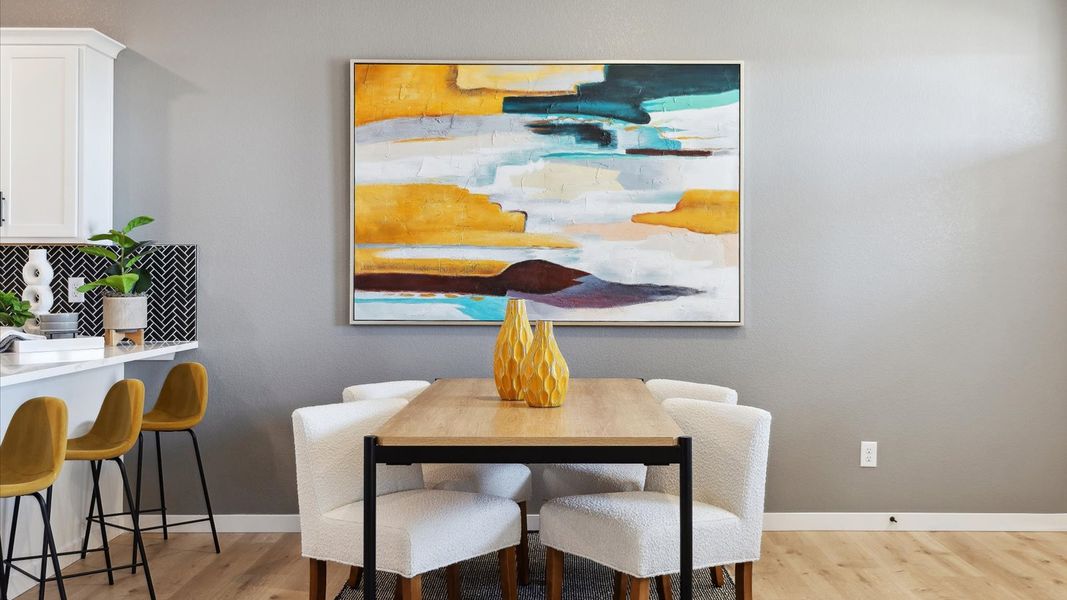 Representative furnished interior of a home built from the Larimer by D.R. Horton in Horizon Uptown, Aurora (Image 8).