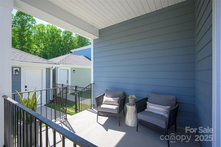Exterior details and patio area of a home in North Creek Village, Huntersville (Image 24).