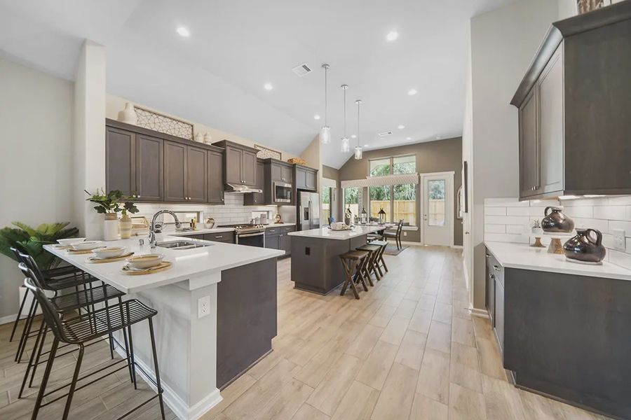 Representative furnished interior of a home built from the Marshall by Chesmar Homes in Stream Waters, Buda (Image 4).