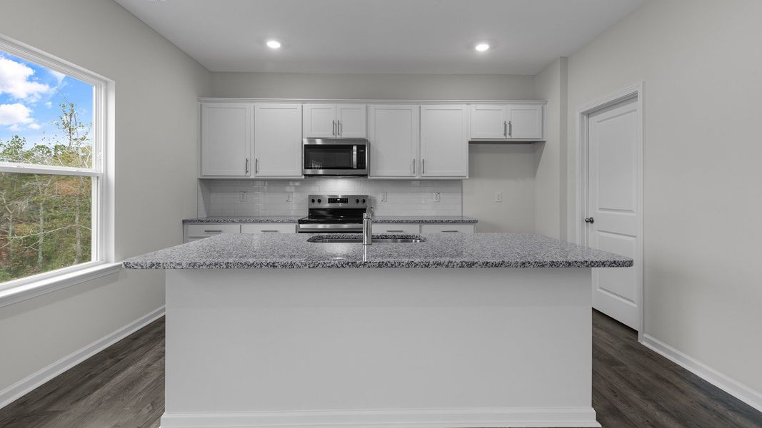Furnished interior view inside a new home in Country Creek, Lexington (Image 4).