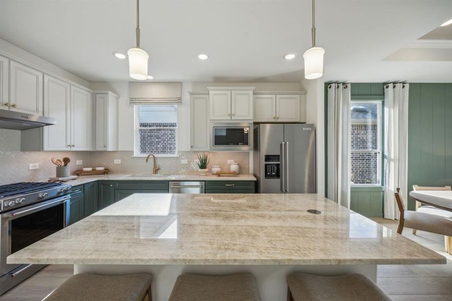 *Model Representation -Spacious kitchen with eat-in bartop island