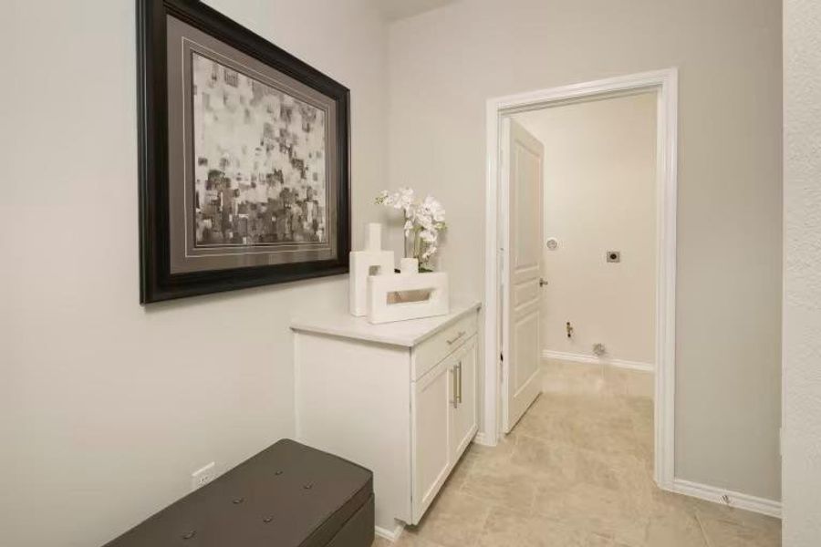 Photo of Pulte model home with same floor plan, not of actual home listed.