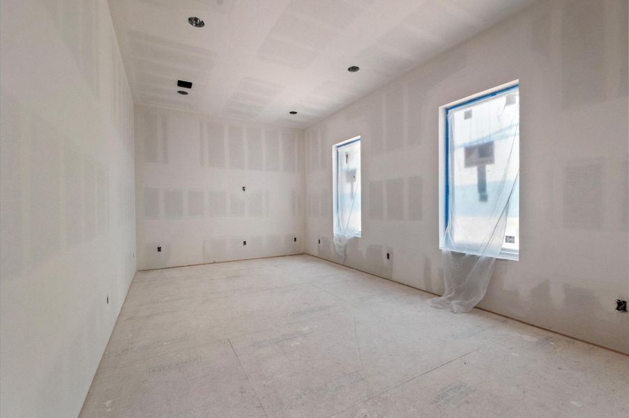Spacious gameroom with natural light.
