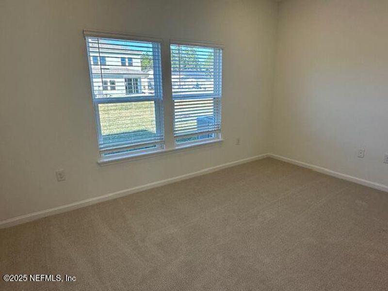 Spacious, unfurnished interior of a new home in Brook Forest - Villas, St. Augustine (Image 21).