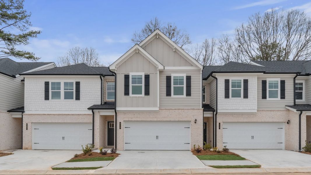 Front exterior of a new home in Diamante, Stockbridge, GA, highlighting curb appeal (Image 1).