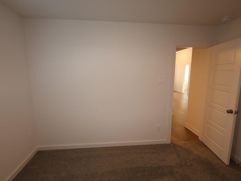 Spacious, unfurnished interior of a new home in Pinewood at Grand Texas, New Caney (Image 4).