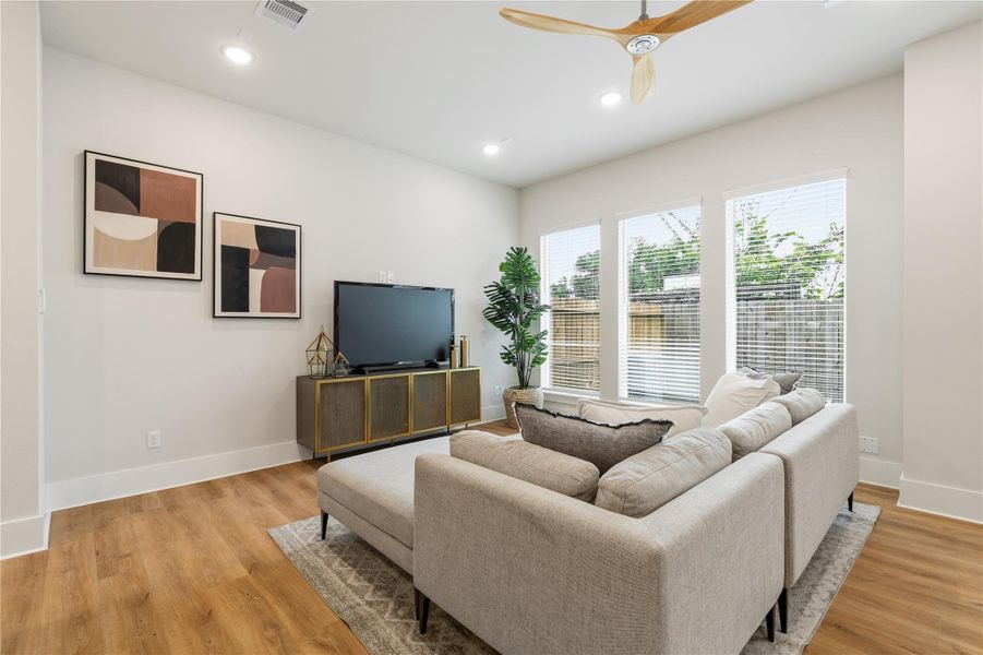 Natural light becomes a design feature here, with oversized picture windows illuminating the living space and enhancing its open, welcoming feel. Natural light becomes a design feature here, with oversized picture windows illuminating the living space and enhancing its open, welcoming feel.
