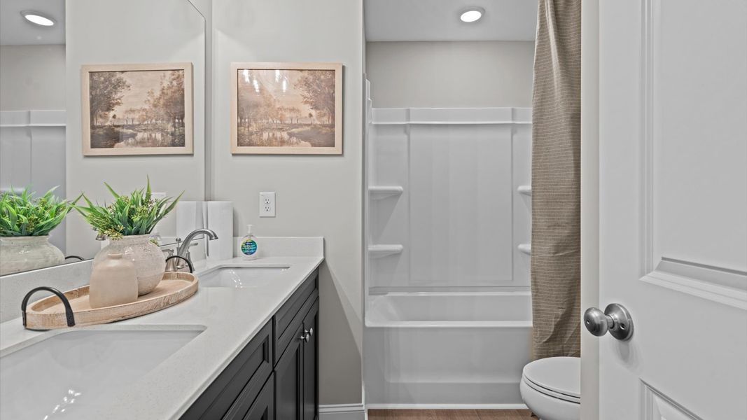 Furnished interior view inside a new home in Essex Townes, Franklinton (Image 11).