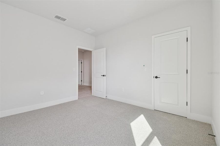 Spacious, unfurnished interior of a new home in Waterset Tradition Series, Apollo Beach (Image 28).