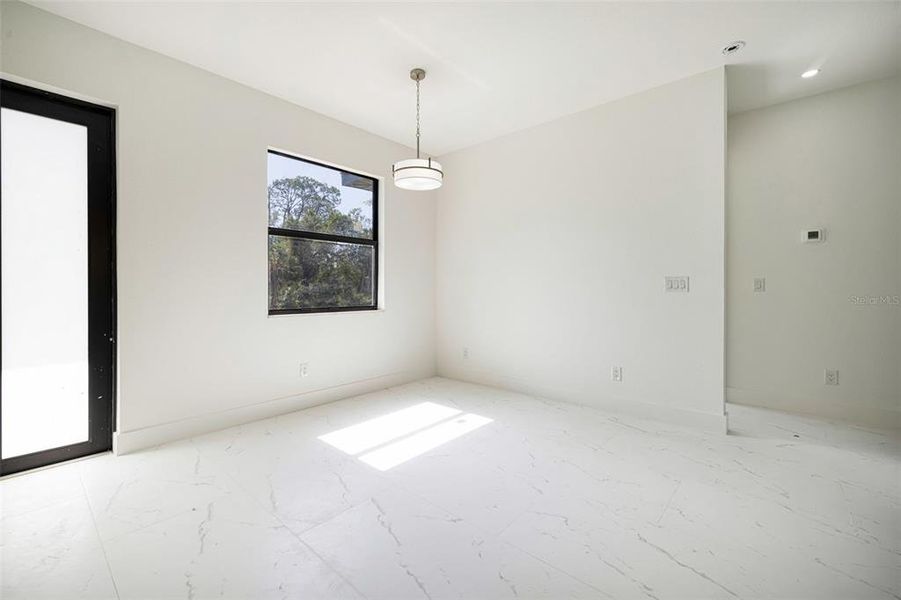 Spacious, unfurnished interior of a new home in , Port Charlotte (Image 21).
