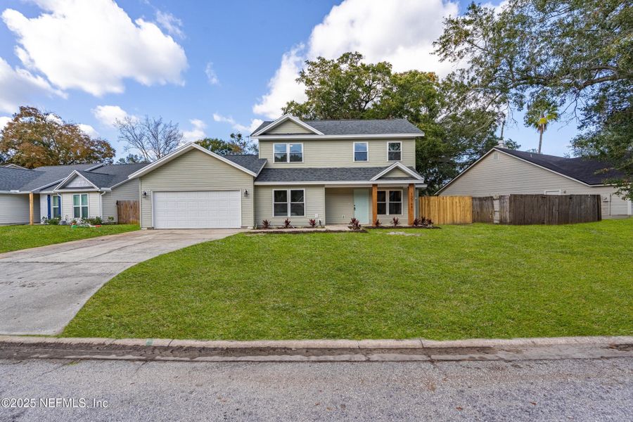 Front exterior of a new home in , Jacksonville, FL, highlighting curb appeal (Image 28).