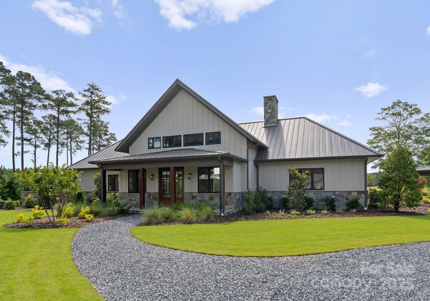 Front exterior of a new home in , Pinehurst, NC, highlighting curb appeal (Image 23).