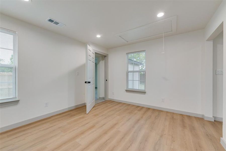 Unfurnished bedroom featuring light hardwood / wood-style floors