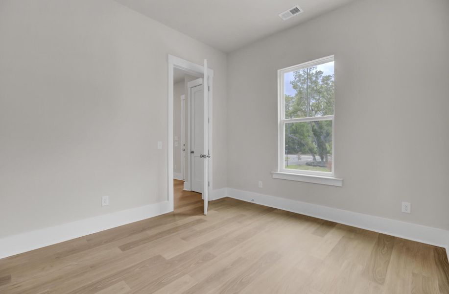 Spacious, unfurnished interior of a new home in Indigo Grove Single Family Homes, Johns Island (Image 43). Spacious, unfurnished interior of a new home in Indigo Grove Single Family Homes, Johns Island (Image 43).