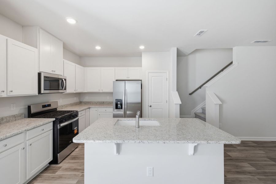 Furnished interior view inside a new home in Carpenter Falls, Durham (Image 9).