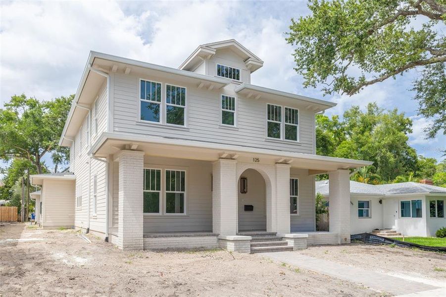 Front exterior of a new home in , St. Petersburg, FL, highlighting curb appeal (Image 6). Front exterior of a new home in , St. Petersburg, FL, highlighting curb appeal (Image 6).