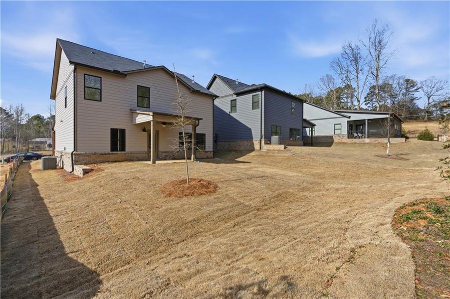 Exterior details and patio area of a home in Meadow Pines, Dallas (Image 19).