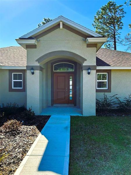 Exterior details and patio area of a home in , Citrus Springs (Image 16).