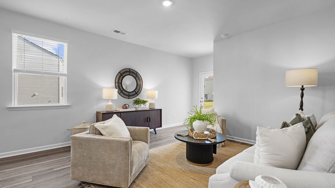 Furnished interior view inside a new home in The Groves at Bees Creek, Ridgeland (Image 8). Furnished interior view inside a new home in The Groves at Bees Creek, Ridgeland (Image 8).