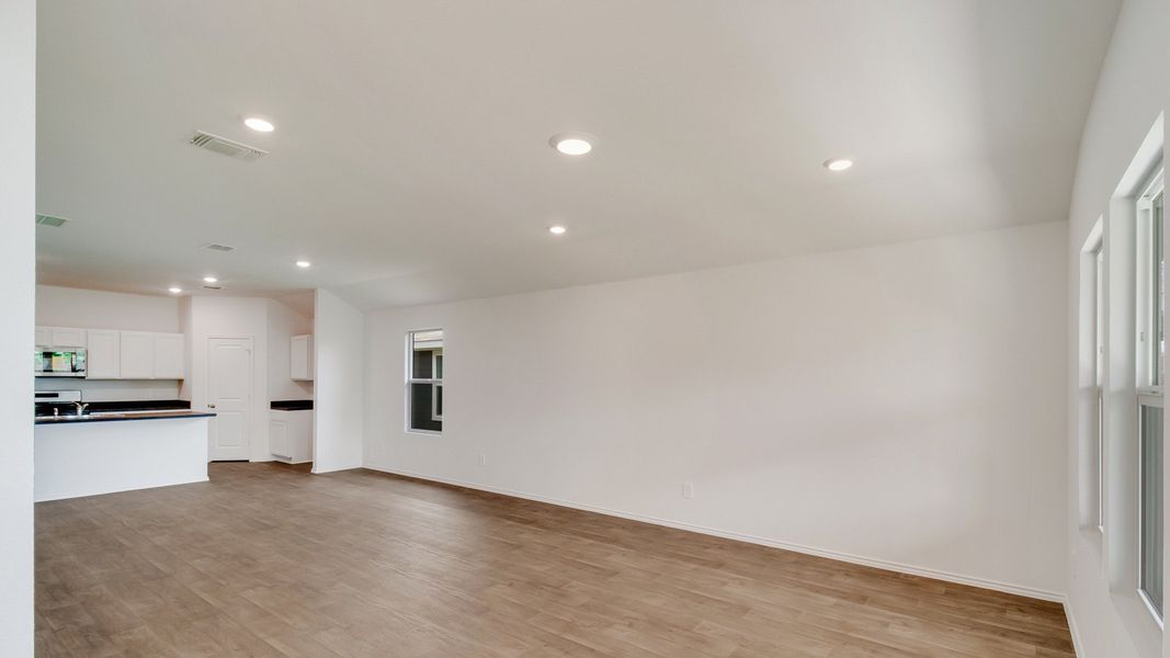 Representative unfurnished interior of a home built from the The Gaven by D.R. Horton in Wayside, Uhland (Image 9).