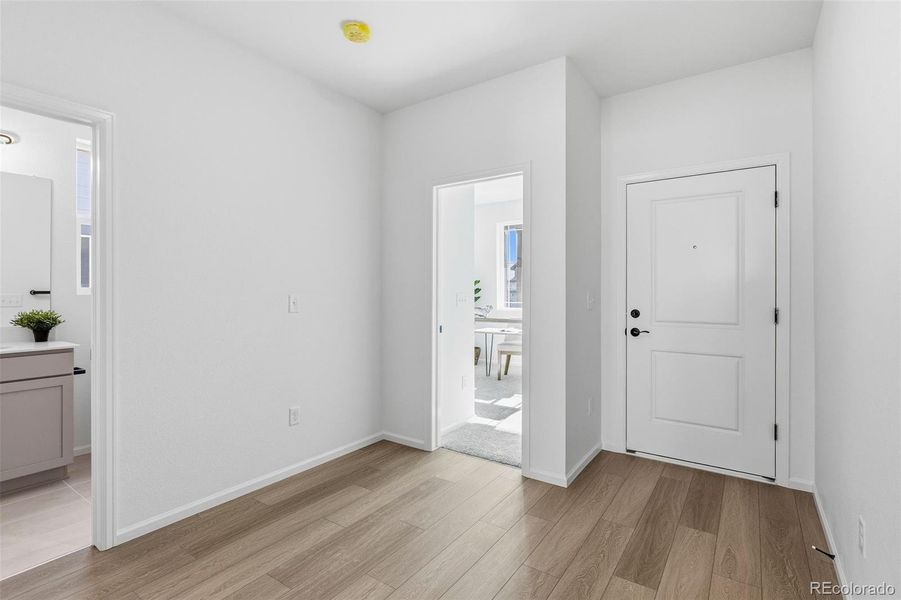 Spacious, unfurnished interior of a new home in The Cottages Collection at Ridgeline Vista, Brighton (Image 24).