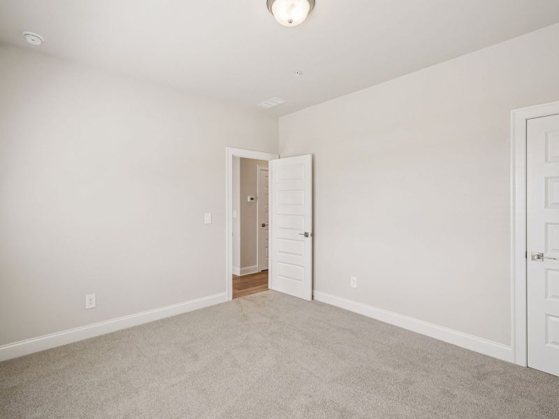 Spacious, unfurnished interior of a new home in Hemingway - Highland Series, Cumming (Image 18).