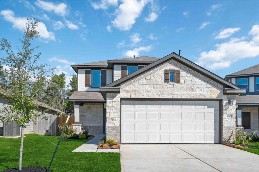 Front exterior of a new home in Meadow Park, Conroe, TX, highlighting curb appeal (Image 1). Front exterior of a new home in Meadow Park, Conroe, TX, highlighting curb appeal (Image 1).