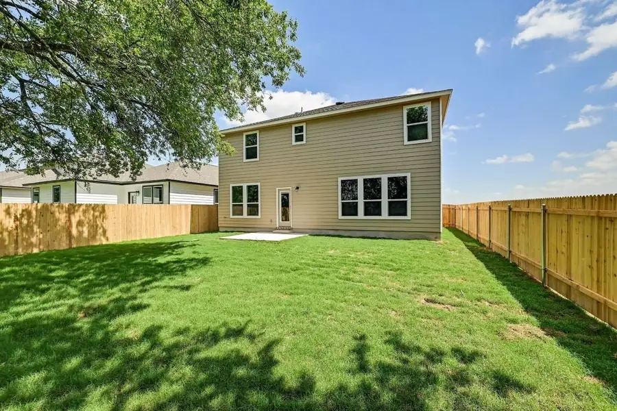 Front exterior of a new home in Hidden Trails, Belton, TX, highlighting curb appeal (Image 2).